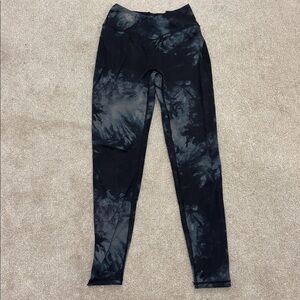 Alphalete Surface Power blue tie leggings.